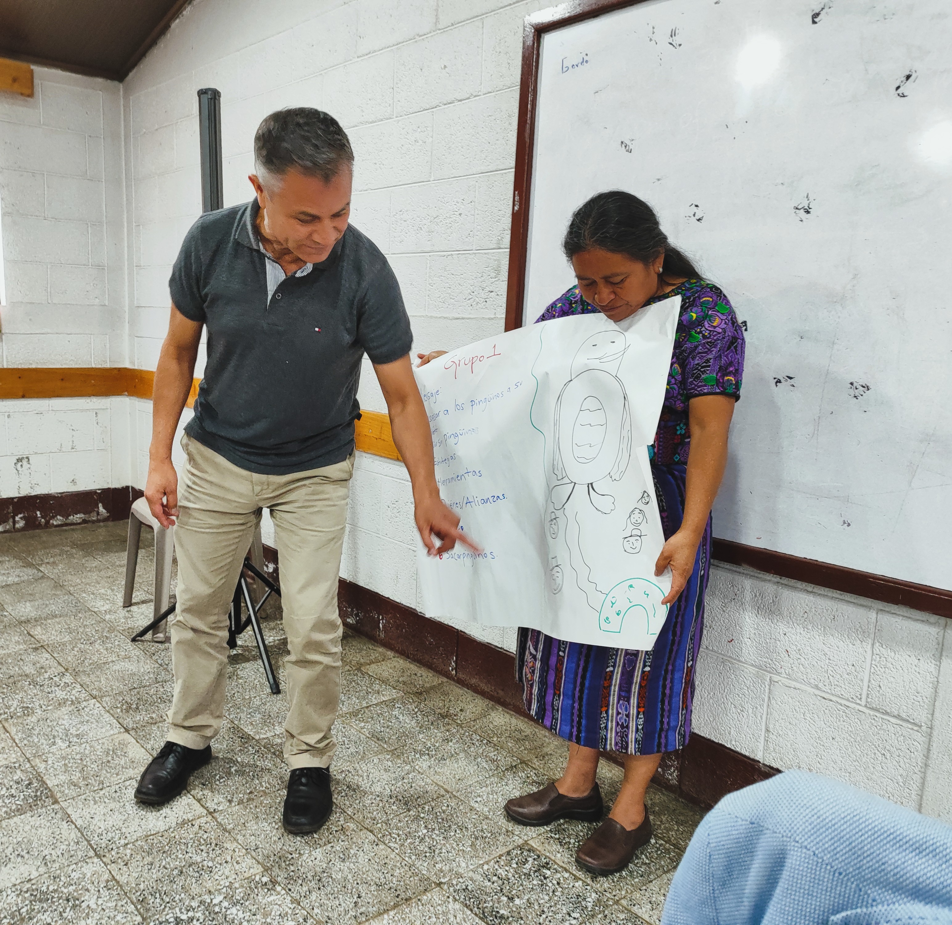 Team presenting their playful storytelling challenge in Spanish